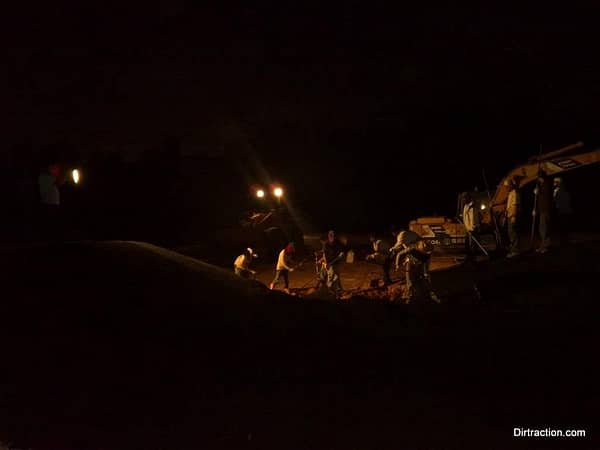 last load of hot asphalt at 8-9PM assisted by various machinery lighting.
